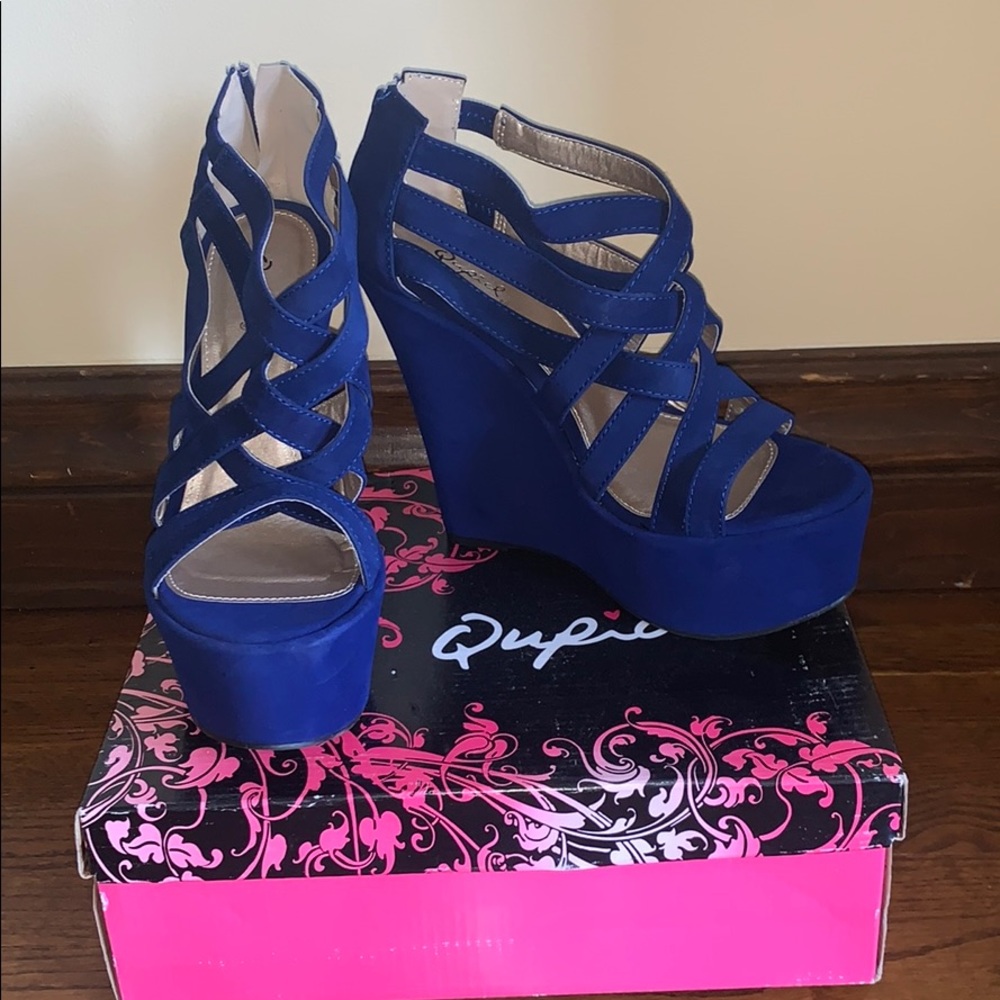 Brand new blue suede platform wedge heels. Size 8!